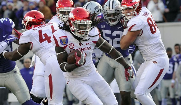 Alex Collins (3) carries the ball against the Kansas State Wildcats in the Liberty Bowl. Arkansas defeated Kansas State Wildcats 45-23. ( Justin Ford-USA TODAY Sports)