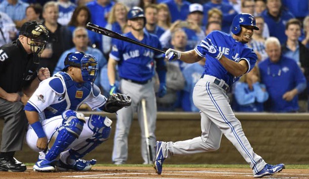 Oct 23, 2015; Kansas City, MO, USA; Toronto Blue Jays left fielder Ben Revere hits a double against the Kansas City Royals in the first inning in game six of the ALCS at Kauffman Stadium. Mandatory Credit: Peter G. Aiken-USA TODAY Sports