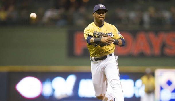 Aug 18, 2015; Milwaukee, WI, USA;  Milwaukee Brewers shortstop Jean Segura (9) throws to first base during the fifth inning against the Miami Marlins at Miller Park. Mandatory Credit: Jeff Hanisch-USA TODAY Sports