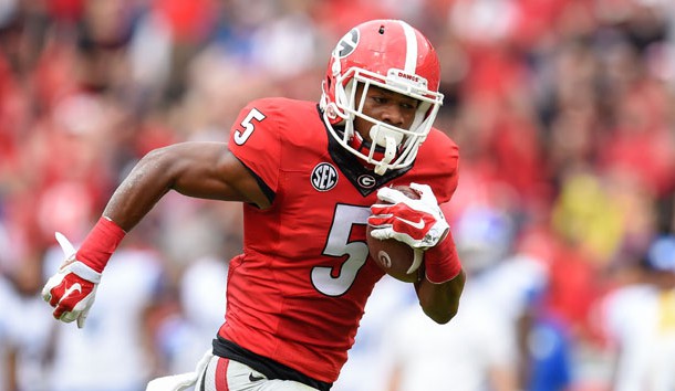 Terry Godwin (5) runs for a touchdown against the Kentucky Wildcats during the first half at Sanford Stadium. Georgia defeated Kentucky 27-3. Photo Credit: Dale Zanine-USA TODAY Sports