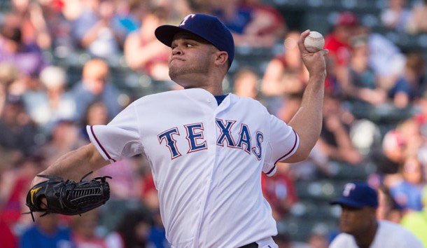 Jun 24, 2015; Arlington, TX, USA; Texas Rangers starting pitcher Wandy Rodriguez (51) pitches against the Oakland Athletics during the first inning at Globe Life Park in Arlington. Mandatory Credit: Jerome Miron-USA TODAY Sports