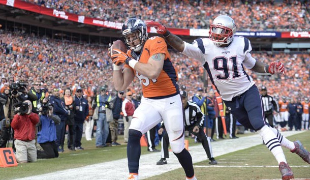 an 24, 2016; Denver, CO, USA; Denver Broncos tight end Owen Daniels (81) makes a touchdown catch in front of New England Patriots outside linebacker Jamie Collins (91) during the first half in the AFC Championship football game at Sports Authority Field at Mile High. Mandatory Credit: Ron Chenoy-USA TODAY Sports