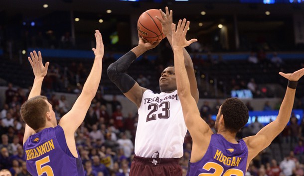 Mar 20, 2016; Oklahoma City, OK, USA; Texas A&M Aggies guard Danuel House (23) shoots against Northern Iowa Panthers guard Matt Bohannon (5) and guard Jeremy Morgan (20) in double overtime during the second round of the 2016 NCAA Tournament at Chesapeake Energy Arena. Mandatory Credit: Mark D. Smith-USA TODAY Sports