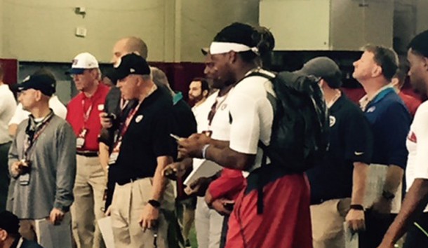Derrick Henry watches as a teammate participates in a drill at Alabama's Pro Day. (Matt Lowe)