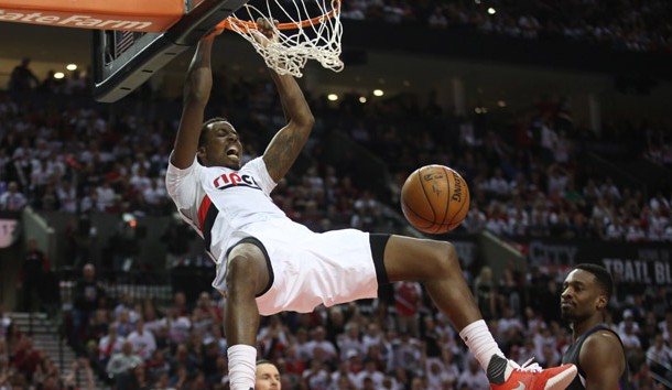 Apr 25, 2016; Portland, OR, USA; Portland Trail Blazers forward Al-Farouq Aminu (8) dunks over Los Angeles Clippers in the second half in game four of the first round of the NBA Playoffs at Moda Center at the Rose Quarter. Mandatory Credit: Jaime Valdez-USA TODAY Sports