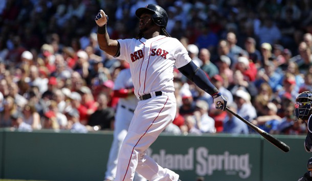 Apr 21, 2016; Boston, MA, USA; Boston Red Sox first baseman Hanley Ramirez (13) gets a base hit to drive in a run against the Tampa Bay Rays in the first inning at Fenway Park. Mandatory Credit: David Butler II-USA TODAY Sports