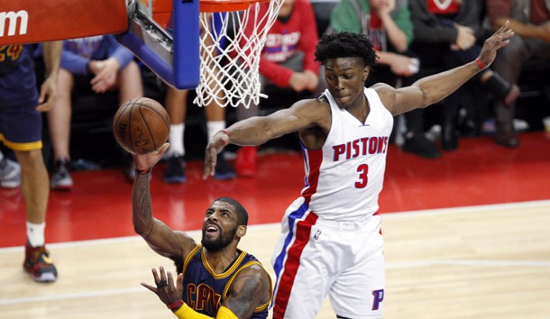 Apr 24, 2016; Auburn Hills, MI, USA; Cleveland Cavaliers guard Kyrie Irving (2) takes a shot against Detroit Pistons forward Stanley Johnson (3) during the third quarter in game four of the first round of the NBA Playoffs at The Palace of Auburn Hills. Cavs win 100-98. Mandatory Credit: Raj Mehta-USA TODAY Sports
