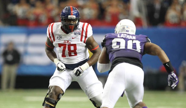 Dec 31, 2014; Atlanta , GA, USA; Mississippi Rebels offensive lineman Laremy Tunsil (78) prepares to block TCU Horned Frogs defensive tackle Terrell Lathan (90) during the first quarter in the 2014 Peach Bowl at the Georgia Dome. Photo Credit: Brett Davis-USA TODAY Sports