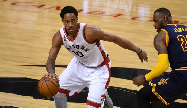 May 21, 2016; Toronto, Ontario, CAN; Toronto Raptors guard DeMar DeRozan (10) dribbles the ball past Cleveland Cavaliers forward LeBron James (23) in game three of the Eastern conference finals of the NBA Playoffs at Air Canada Centre. Mandatory Credit: Dan Hamilton-USA TODAY Sports