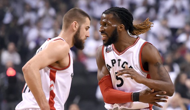 May 5, 2016; Toronto, Ontario, CAN;  Toronto Raptors forward DeMarre Carroll (5) slaps hands with center Jonas Valanciunas (17) after scoring a basket against Miami Heat  in game two of the second round of the NBA Playoffs at Air Canada Centre. The Raptors won 96-92.  Mandatory Credit: Dan Hamilton-USA TODAY Sports