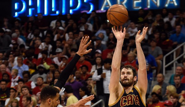 May 8, 2016; Atlanta, GA, USA; Cleveland Cavaliers forward Kevin Love (0) shoots over Atlanta Hawks forward Thabo Sefolosha (25) during the second half in game four of the second round of the NBA Playoffs at Philips Arena. The Cavaliers defeated the Hawks 100-99. Mandatory Credit: Dale Zanine-USA TODAY Sports