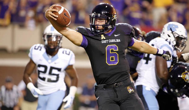 Sep 20, 2014; Greenville, NC, USA; East Carolina Pirates quarterback Kurt Benkert (6) goes in for a touchdown run against the North Carolina Tar Heels during the 4th quarter at Dowdy-Ficklen Stadium. The East Carolina Pirates defeated the North Carolina Tar Heels 70-41. Mandatory Credit: James Guillory-USA TODAY Sports