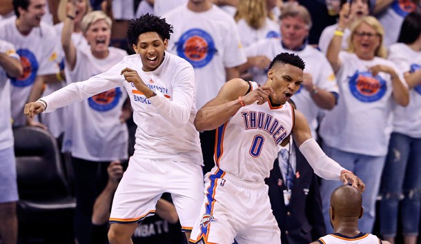 May 24, 2016; Oklahoma City, OK, USA; Oklahoma City Thunder guard Russell Westbrook (0) and guard Cameron Payne (left) celebrate during the fourth quarter against the Golden State Warriors in game four of the Western conference finals of the NBA Playoffs at Chesapeake Energy Arena. Mandatory Credit: Kevin Jairaj-USA TODAY Sports