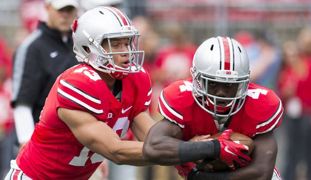 Stephen Collier (13) hands the ball off to  running back Curtis Samuel (4) during warmups before the game against the Kent State Golden Flashes  at Ohio Stadium in 2014. Photo Credit: Greg Bartram-USA TODAY Sports