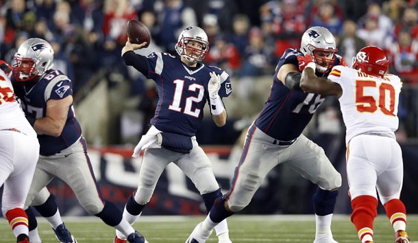 Jan 16, 2016; Foxborough, MA, USA; New England Patriots quarterback Tom Brady (12) throws a pass during the second quarter against the Kansas City Chiefs in the AFC Divisional round playoff game at Gillette Stadium. Mandatory Credit: Greg M. Cooper-USA TODAY Sports