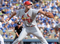 Surging Wainwright faces Reds in series finale