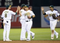 Semien leads Athletics past Brewers