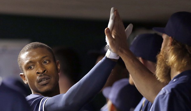 Jun 24, 2016; Cincinnati, OH, USA; San Diego Padres left fielder Melvin Upton Jr. is congratulated after hitting a two-run home run against the Cincinnati Reds during the seventh inning at Great American Ball Park. Mandatory Credit: David Kohl-USA TODAY Sports