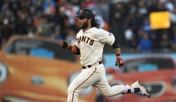 Jun 12, 2016; San Francisco, CA, USA; San Francisco Giants shortstop Brandon Crawford (35) rounds the bases after hitting a triple during the seventh inning against the Los Angeles Dodgers at AT&T Park. Mandatory Credit: Kenny Karst-USA TODAY Sports