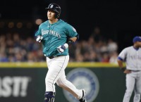Lee's two homers power Mariners past Rangers