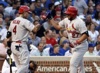 Moss, Peralta power Cardinals past Cubs