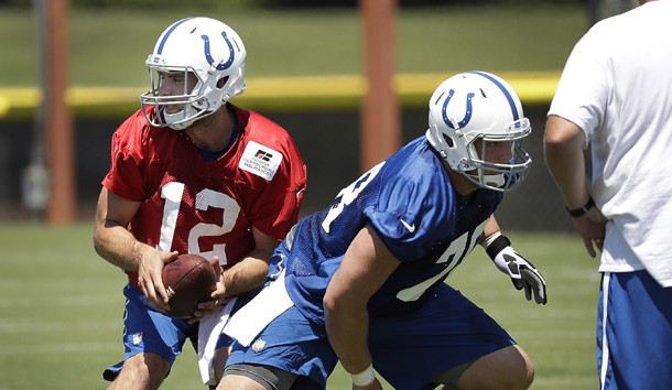 Jul 27, 2016; Anderson, IN, USA; Indianapolis Colts quarterback Andrew Luck (12) works with center Ryan Kelly (78) during training camp at Anderson University. Photo Credit: Matt Kryger/Indianapolis Star via USA TODAY Sports
