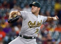 Hill helps A's outlast Astros