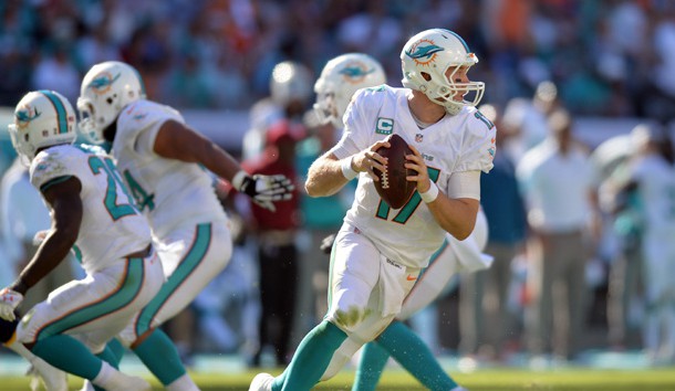Nov 2, 2014; Miami Gardens, FL, USA; Miami Dolphins quarterback Ryan Tannehill (17) runs with the ball against the San Diego Chargers during the second half at Sun Life Stadium. The Dolphins won 37-0. Photo Credit: Steve Mitchell-USA TODAY Sports