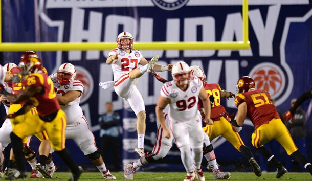 Dec 27, 2014; San Diego, CA, USA; Nebraska Cornhuskers punter Sam Foltz (27) punts during the second quarter against the USC Trojans in the 2014 Holiday Bowl at Qualcomm Stadium. Photo Credit: Jake Roth-USA TODAY Sports
