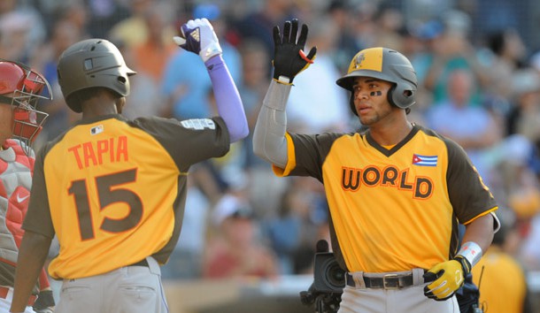 Jul 10, 2016; San Diego, CA, USA; World infielder Yoan Moncada (right) celebrates with teammate Raimel Tapia (15) after hitting a two-run home run in the 7th inning during the All Star Game futures baseball game at PetCo Park. Photo Credit: Gary A. Vasquez-USA TODAY Sports