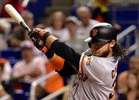 Crawford's seven hits help Giants outlast Marlins