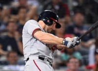 Robinson's RBI single in 9th lifts Nats past Braves