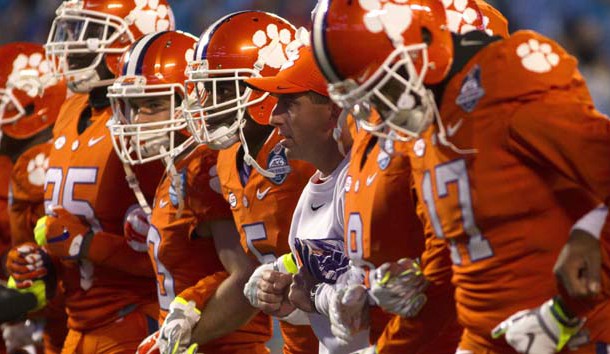 Dec 5, 2015; Charlotte, NC, USA; Clemson Tigers head coach Dabo Swinney (C) and his team prior to their ACC football championship game against the North Carolina Tar Heels at Bank of America Stadium. Photo Credit: Joshua S. Kelly-USA TODAY Sports