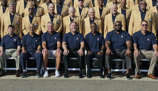 Aug 4, 2016; Canton, OH, USA; (From left to right) San Francisco 49ers owner Edward J. DeBartolo, Jr, Indianapolis Colts head coach Tony Dungy, former Green Bay Packers quarterback Brett Favre, linebacker Kevin Greene, Indianapolis Colts former wide receiver Marvin Harrison, Chicago Bears former tackle Orlando Pace, and Oakland Raiders former quarterback Ken Stabler take at group photo with other members as they pose for the official photo of the NFL Hall of Fame Class of 2016. Photo Credit: Rick Wood/Milwaukee Journal Sentinel via USA TODAY Network