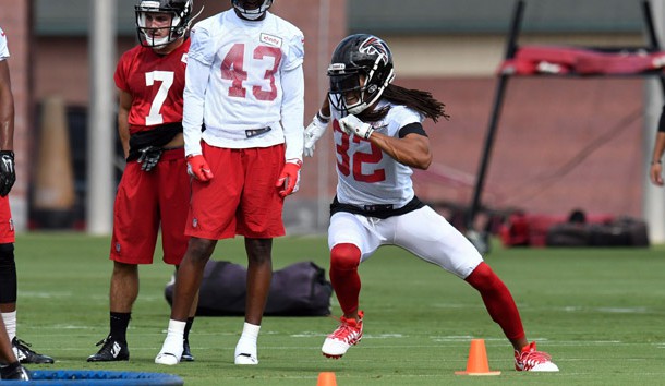 Atlanta Falcons cornerback Jalen Collins (32) performs a drill on the field during training camp at the Atlanta Falcons Training Facility. Photo Credit: Dale Zanine-USA TODAY Sports