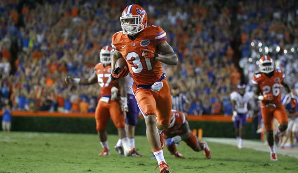 Sep 12, 2015; Gainesville, FL, USA;  Florida Gators defensive back Jalen Tabor (31) intercepts the ball and runs it back for a touchdown against the East Carolina Pirates during the second half at Ben Hill Griffin Stadium.  Florida Gators defeated the East Carolina Pirates 31-24. Photo Credit: Kim Klement-USA TODAY Sports