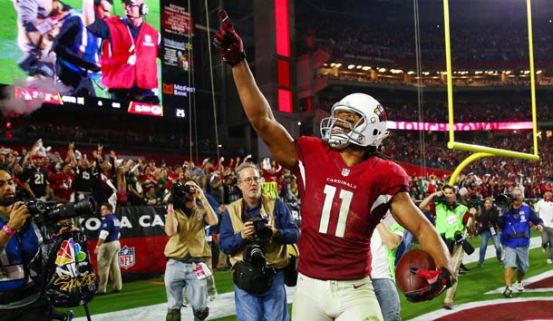 Jan 16, 2016; Glendale, AZ, USA; Arizona Cardinals wide receiver Larry Fitzgerald (11) celebrates after scoring the winning touchdown against the Green Bay Packers during overtime in a NFC Divisional round playoff game at University of Phoenix Stadium. Photo Credit: Mark J. Rebilas-USA TODAY Sports