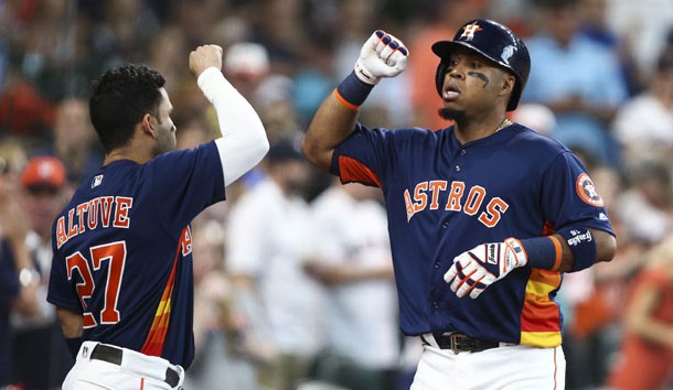 Jul 24, 2016; Houston, TX, USA; Houston Astros third baseman Luis Valbuena (18) celebrates with second baseman Jose Altuve (27) after hitting a home run during the first inning against the Los Angeles Angels at Minute Maid Park. Photo Credit: Troy Taormina-USA TODAY Sports