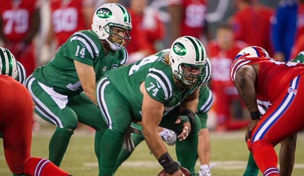 Nick Mangold (74) hikes the ball to New York Jets quarterback Ryan Fitzpatrick (14) in the 2nd half against the Buffalo Bills at MetLife Stadium last season. The Bills defeated the Jets 22-17 Photo Credit: William Hauser-USA TODAY Sports