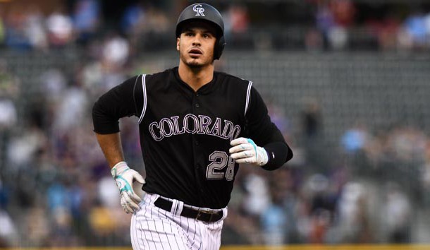 Aug 3, 2016; Denver, CO, USA; Colorado Rockies third baseman Nolan Arenado (28) heads home after hitting a three run home run in the first inning against the Los Angeles Dodgers at Coors Field. Photo Credit: Ron Chenoy-USA TODAY Sports