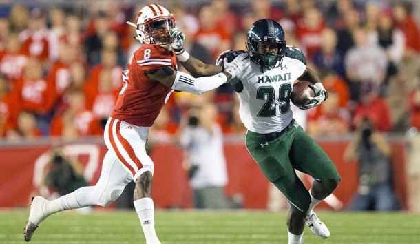 Paul Harris (29) rushes with the football as Wisconsin Badgers cornerback Sojourn Shelton (8) defends during the second quarter at Camp Randall Stadium last year. Photo Credit: Jeff Hanisch-USA TODAY Sports