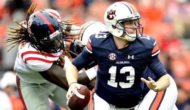 Sean White (13) looks for a receiver against the Ole Miss Rebels at Jordan Hare Stadium. Photo Credit: Garrett Reid-USA TODAY Sports