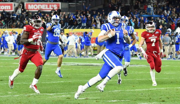 Dec 26, 2015; Bronx, NY, USA; Duke Blue Devils quarterback Thomas Sirk (1) runs with the ball on his way to the end-zone for a touchdown against the Indiana Hoosiers during the second quarter in the 2015 New Era Pinstripe Bowl at Yankee Stadium.  Photo Credit: Rich Barnes-USA TODAY Sports