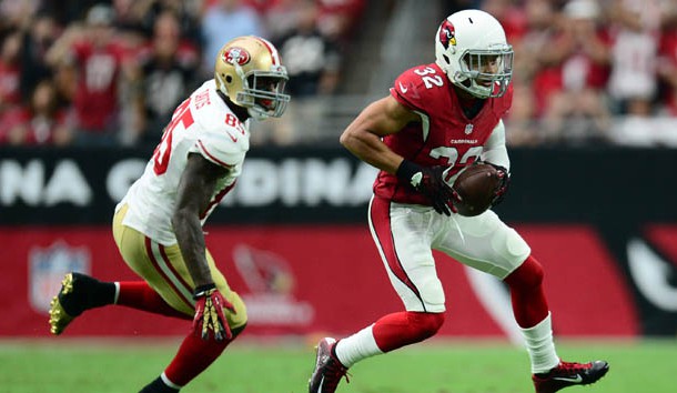 Sep 27, 2015; Glendale, AZ, USA; Arizona Cardinals free safety Tyrann Mathieu (32) intercepts a pass intended for San Francisco 49ers tight end Vernon Davis (85) during the first half at University of Phoenix Stadium. Photo Credit: Joe Camporeale-USA TODAY Sports