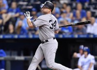 McCann helps Yankees rally past Royals