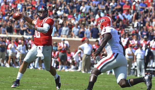 Sep 24, 2016; Oxford, MS, USA; Mississippi Rebels quarterback Chad Kelly (10) drops back to pass under pressure from Georgia Bulldogs linebacker Roquan Smith (3) during the first quarter of the game at Vaught-Hemingway Stadium. Photo Credit: Matt Bush-USA TODAY Sports
