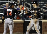 Yelich continues power surge as Marlins edge Mets