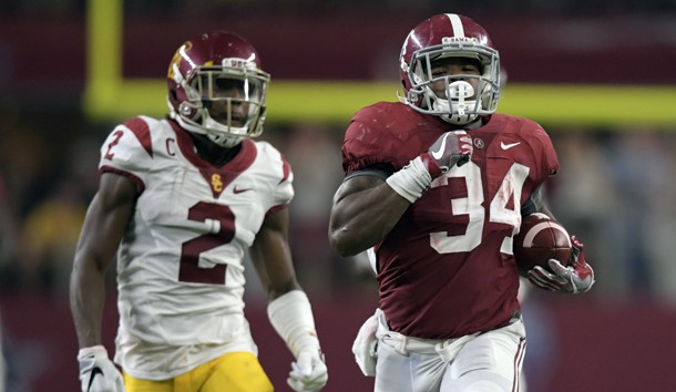 Sep 3, 2016; Arlington, TX, USA; Alabama Crimson Tide running back Damien Harris (34) runs past USC Trojans defensive back Adoree' Jackson (2) during the third quarter at AT&T Stadium. Photo Credit: Kirby Lee-USA TODAY Sports