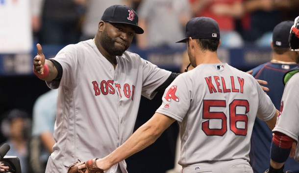 Sep 25, 2016; St. Petersburg, FL, USA; Boston Red Sox designated hitter David Ortiz (34) congratulates winning pitcher Joe Kelly (56) on a win against the Tampa Bay Rays at Tropicana Field. Photo Credit: Jeff Griffith-USA TODAY Sports