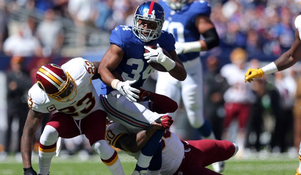 Sep 25, 2016; East Rutherford, NJ, USA; New York Giants running back Shane Vereen (34) carries the ball as Washington Redskins safety DeAngelo Hall (23) and safety David Bruton Jr. (30) defend during the first quarter at MetLife Stadium. Photo Credit: Brad Penner-USA TODAY Sports